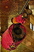 Inle Lake Myanmar. Phaung Daw Oo Paya. Enshrined in the pagoda are five small ancient Buddha images that have been transformed into amorphous blobs by the sheer volume of gold leaf applied by devotees.  